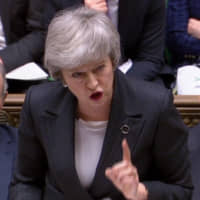 British Prime Minister Theresa May speaks during the weekly Prime Minister\'s Questions in the House of Commons on Wednesday. | AFP-JIJI