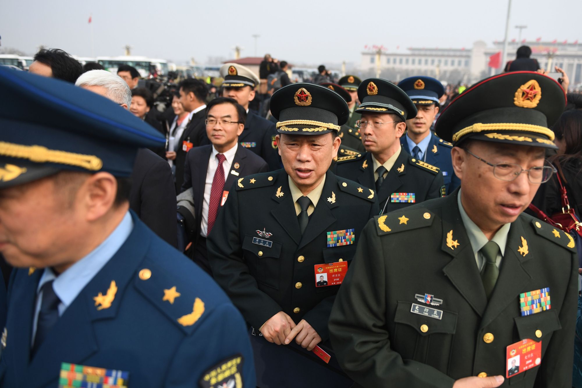 Military delegates arrive to attend the opening session of the Chinese People's Political Consultative Conference (CPPCC) at the Great Hall of the People in Beijing on Sunday. | AFP-JIJI