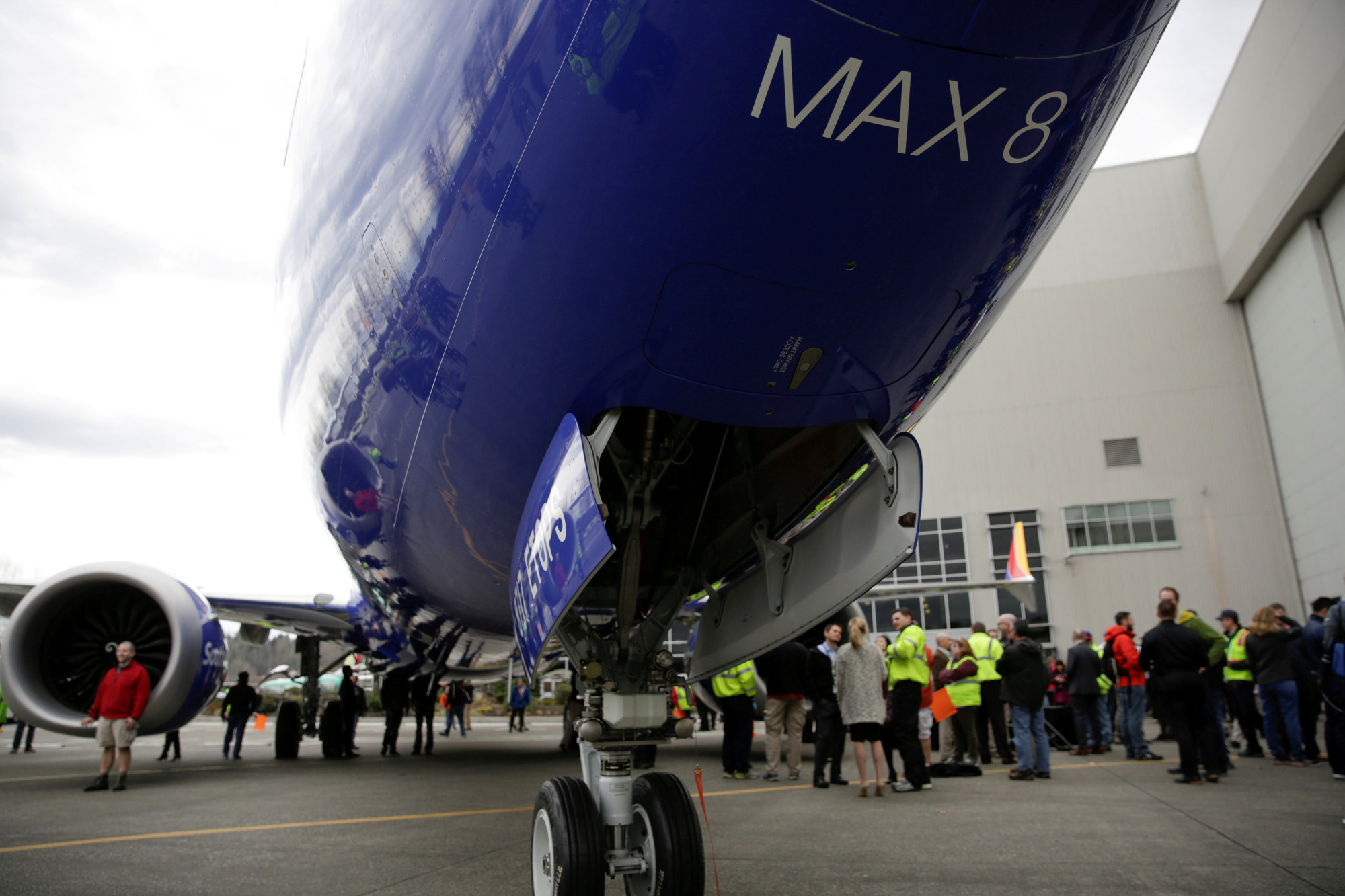 Boeing employees are pictured in front of a 737 Max 8, produced for Southwest Airlines, as Boeing celebrates the 10,000th 737 to come off the production line in Renton, Washington, on March 13, 2018. | REUTERS