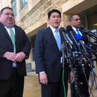 U.S. Attorney Robert Hur of the District of Maryland speaks as Art Walker (left), special agent from the Coast Guard investigative service, and Gordon Johnson, special agent in charge of the FBI\'s Baltimore office, listen during a news conference about Coast Guard Lt. Christopher Paul Hasson, outside the federal courthouse in Greenbelt, Maryland, Feb. 21. | AP