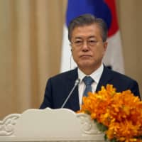 South Korean President Moon Jae-in attends a news conference after a signing ceremony at the Peace Palace in Phnom Penh on Friday. | REUTERS