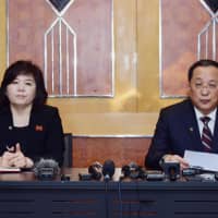 North Korean Foreign Minister Ri Yong Ho speaks as vice minister of Foreign Affairs Choe Son Hui looks on during a press conference in Hanoi early Friday following the U.S.-North Korea summit. North Korea said it had offered to dismantle its Yongbyon nuclear plant in exchange for partial sanctions relief at Kim\'s summit with Trump, after the meeting ended without agreement. | AFP-JIJI