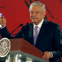 Mexican President Andres Manuel Lopez Obrador speaks to the media during a news conference to announce a plan to strengthen finances of state oil firm Pemex, at the National Palace in Mexico City Feb. 15. | REUTERS
