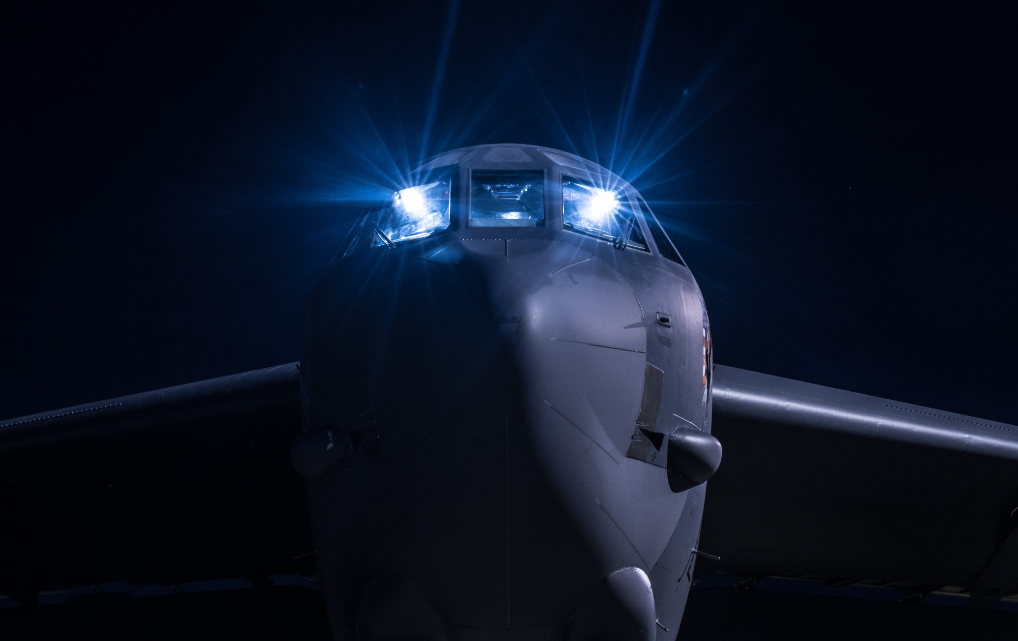 A U.S. Air Force B-52 crew works in the cockpit before launching an early morning sortie from Royal Australian Air Force Base Darwin in Australia in April last year. | U.S. AIR FORCE