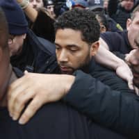 \"Empire\" actor Jussie Smollett leaves Cook County jail following his release in Chicago on Feb. 21. | AP