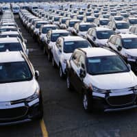 Imported automobiles at the port of Newark in New Jersey | REUTERS