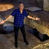 Uri Geller gestures during an interview at the Uri Geller Museum in Jaffa, near Tel Aviv, last August. | REUTERS