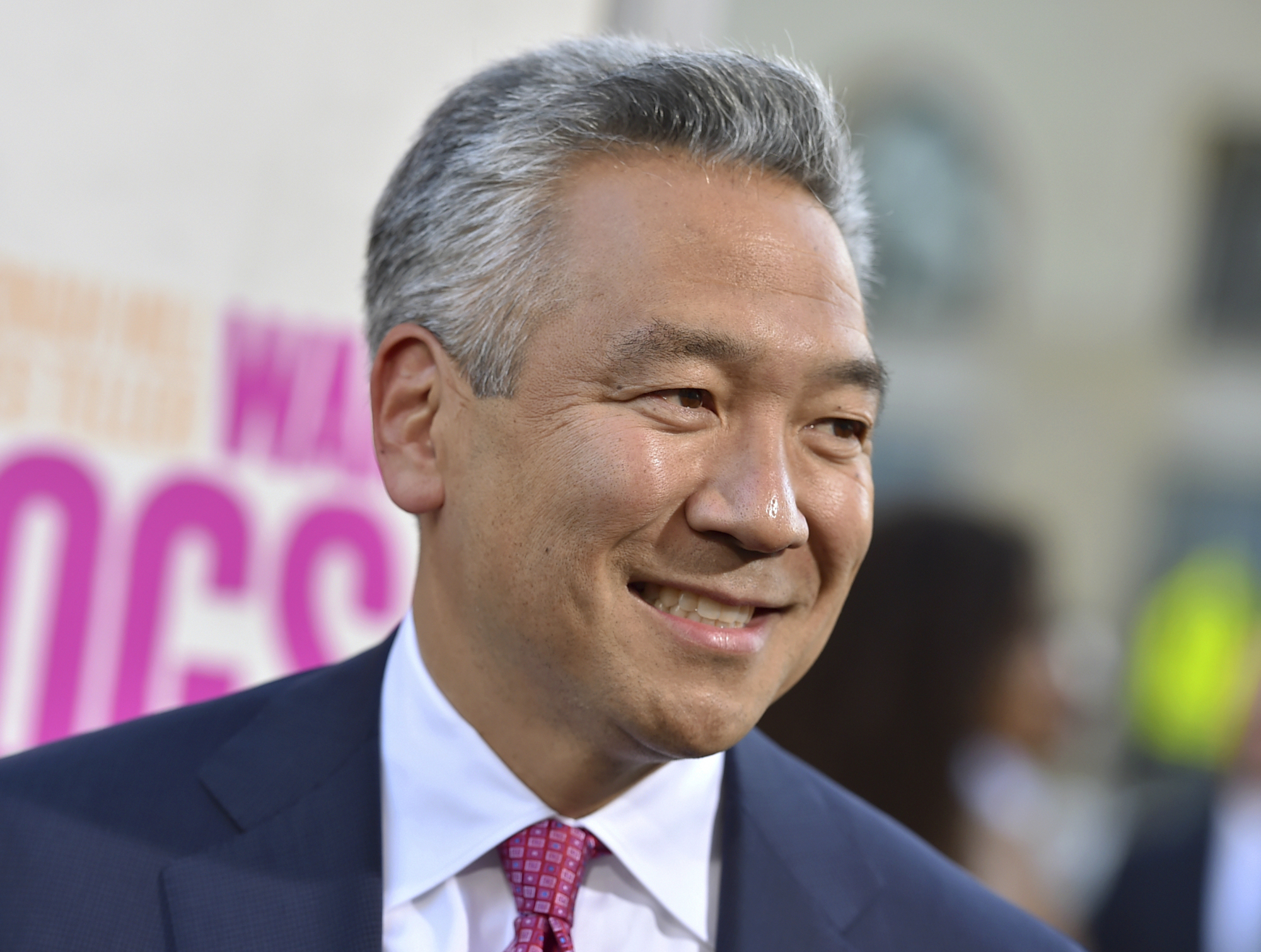 Kevin Tsujihara, chairman and CEO, Warner Bros. Entertainment, arrives at the Los Angeles premiere of 'War Dogs' in 2016. Tsujihara is stepping down after claims that he promised acting roles in exchange for sex. As Warner Bros. chairman and chief executive officer at one of Hollywood's most powerful and prestigious studios, Tsujihara is one of the highest ranking executives to be felled by sexual misconduct allegations. | JORDAN STRAUSS / INVISION / VIA AP