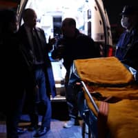 Yasemin Colak\'s brother frantically tries to find out why the ambulance crew has left the immigration center with an empty gurney and is not taking his brother-in-law to a hospital. | CHISATO TANAKA