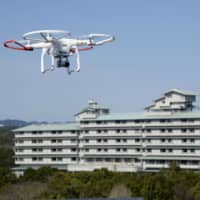 A new bill aims to ban the flying of drones over U.S. military bases and Self-Defense Forces\' facilities in Japan. | KYODO