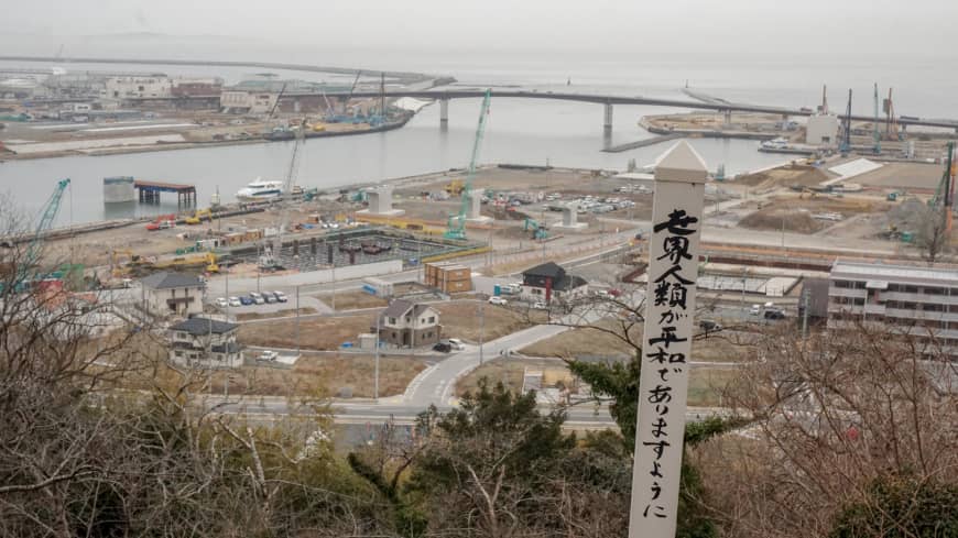 Heavy machinery dots the coastline of Ishinomaki, Miyagi Prefecture, on Feb. 19. The area is still rebuilding from the extensive damage caused by the Great East Japan Earthquake and ensuing tsunami on March 11, 2011.