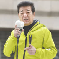 Ichiro Matsui on Sunday makes a stump speech in Osaka on the first day of official campaigning for the April 7 mayoral election. | KYODO