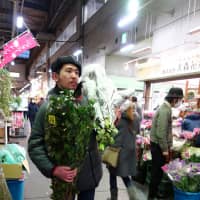 Prime cuts: Tsuyoshi Hirasawa stocks up on plants and flowers at Ota Shijo, Japan\'s largest flower market and the third-largest flower market in the world. | ALEX MARTIN