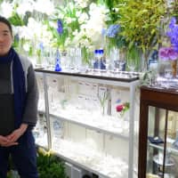 Tatsuro Ohno sells flowers, old Baccarat crystal glassware and Royal Copenhagen porcelain at a boutique in Ginza. | ALEX MARTIN