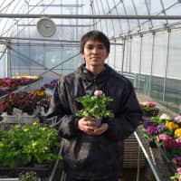 Kazuaki Ebisawa operates a flower farm in the suburban city of Mitaka in western Tokyo. | ALEX MARTIN
