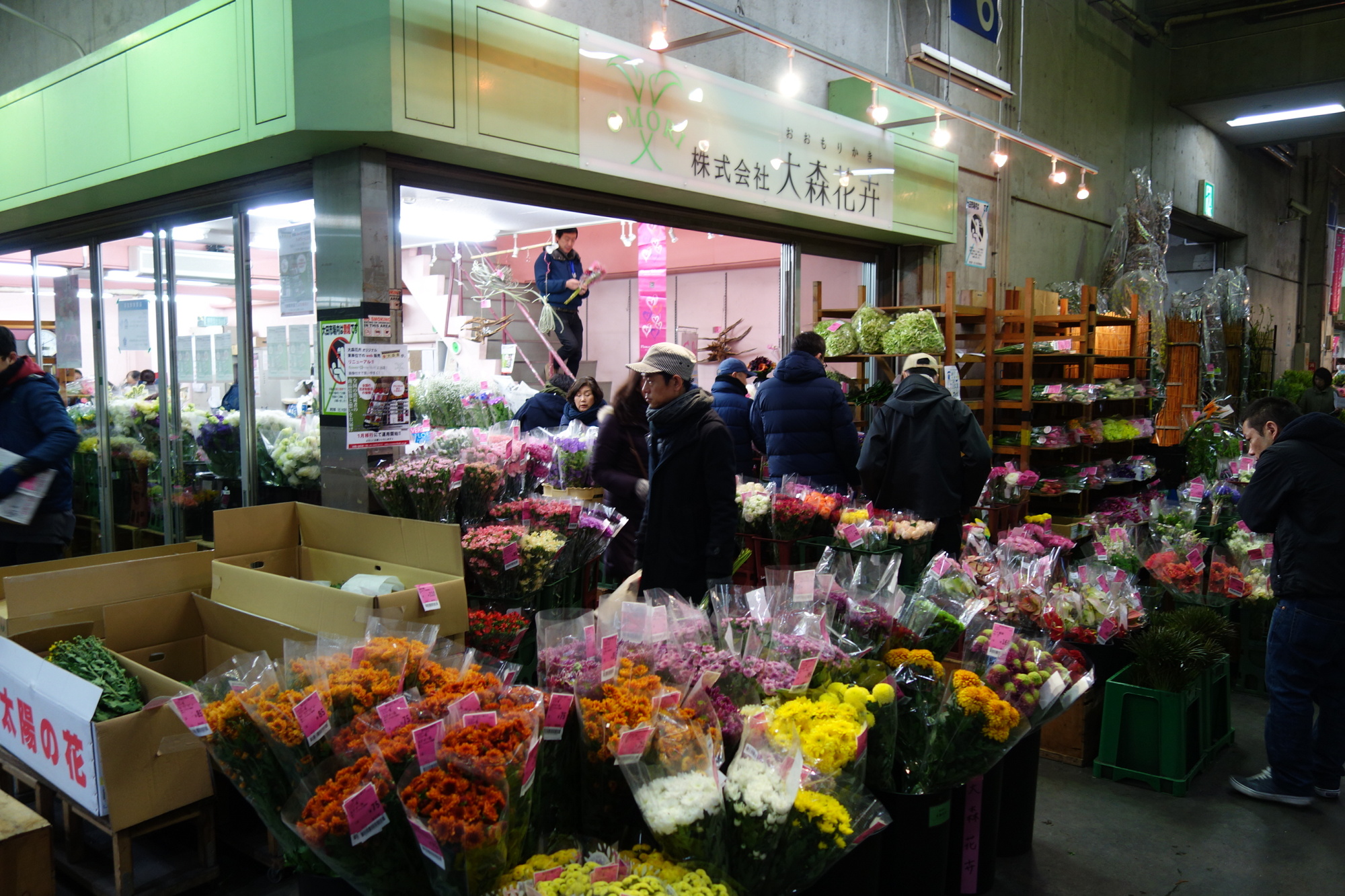 Flowers sit on display at Omori Kaki, an intermediary wholesaler at Tokyo’s Ota Shijo market.