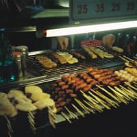 Evening treats: Taipei\'s Tonghua night market offers a smorgasbord of pan-Asian cuisine. | CHRIS RUSSELL