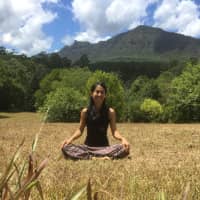 Country life: Tomoko Houtzager relaxes on her farm in New South Wales, Australia. | COURTESY OF HARVESTMOON