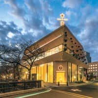 Designed and built from the ground up: The exterior of the Kengo Kuma-designed roastery. | COURTESY OF STARBUCKS