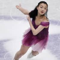 Kaori Sakamoto skates in the women\'s short program on Wednesday night. Sakamoto sits in second place with 76.86 points. | KYODO