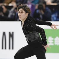 Keiji Tanaka competes in the men\'s short program on Thursday. Tanaka is in 19th place with 78.76 points. | KYODO