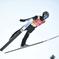 Ryoyu Kobayashi soars through the air during a World Cup ski jumping event on Thursday in Trondheim, Norway. | AFP-JIJI