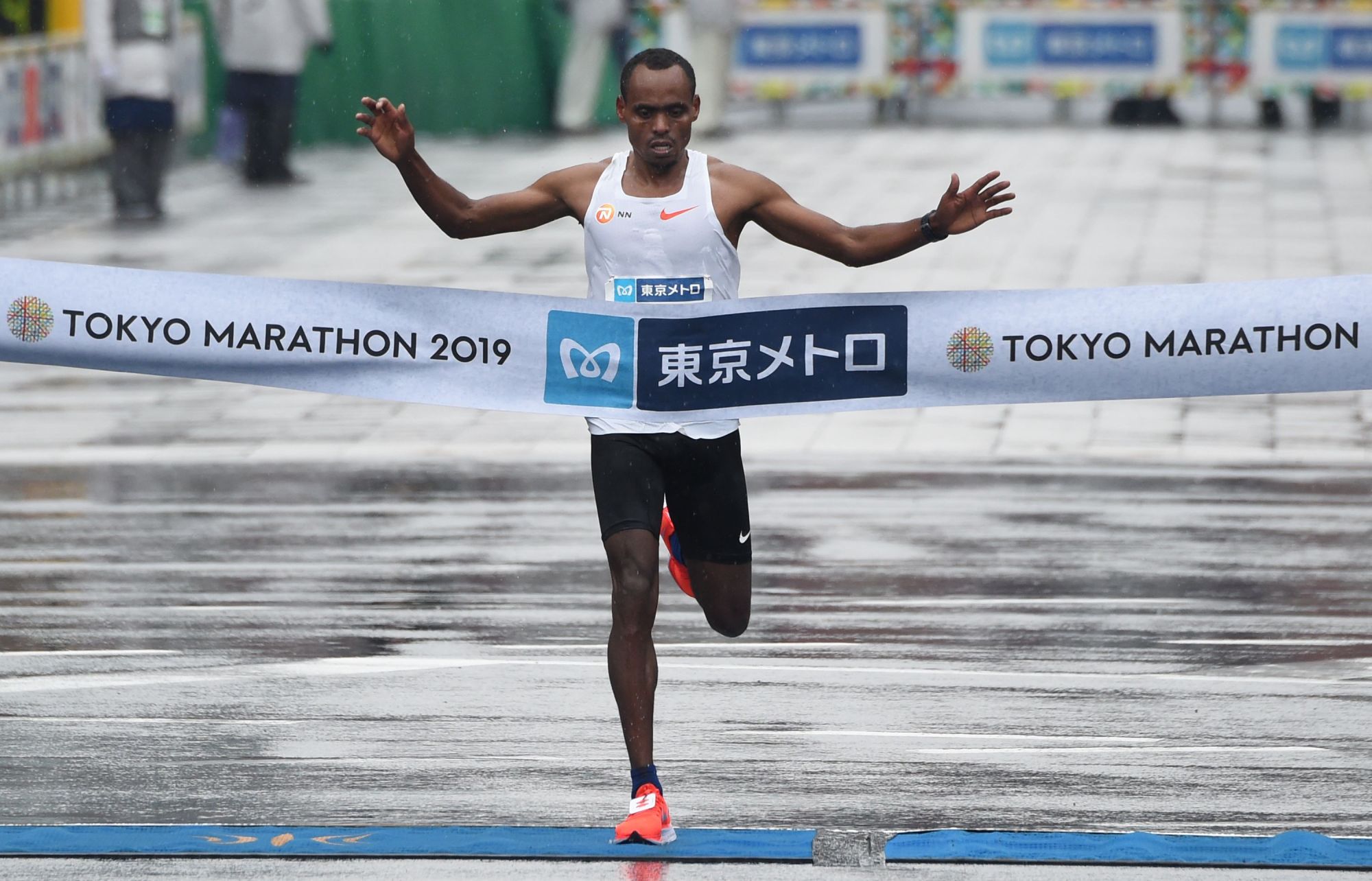 Birhanu Legese crosses the finish line to win the Tokyo Marathon on Sunday. | AFP-JIJI