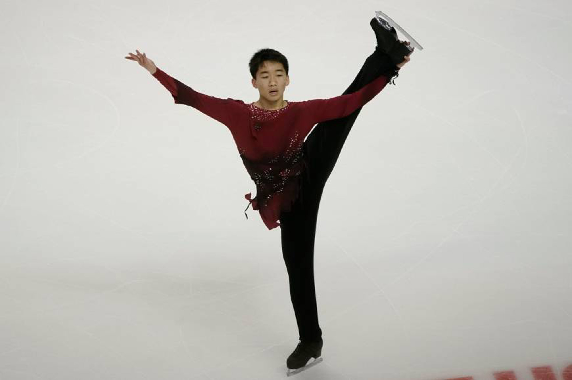 Tomoki Hiwatashi, seen here in a file photo from last season, captured the men's crown at the world junior championships on Friday night in Zagreb. | USA TODAY / VIA REUTERS
