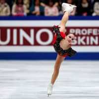 Russia\'s Alina Zagitova competes in the free skate at the World Figure Skating Championships on Friday night at Saitama Super Arena. Zagitova captured the women\'s title with 237.50 points. | REUTERS