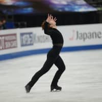 Keiji Tanaka performs his short program on Thursday evening. | DAN ORLOWITZ