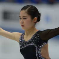 Satoko Miyahara performs her free skate on Friday night at Saitama Super Arena. | DAN ORLOWITZ