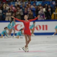 Kazakhstan\'s Elizabet Tursynbaeva salutes the crowd after her free skate. | DAN ORLOWITZ
