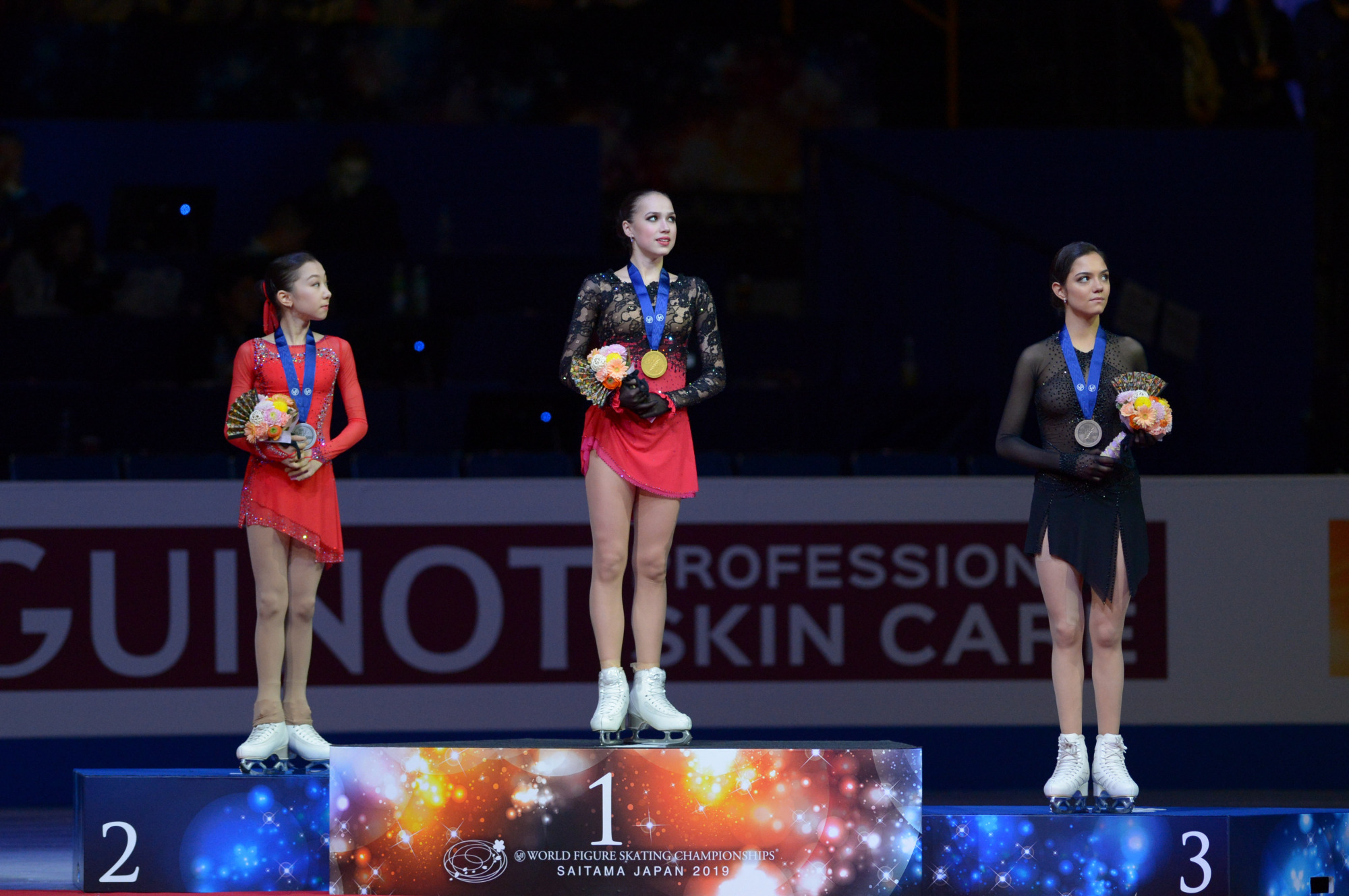 Alina Zagitova (center) won the competition with 237.50, followed by Elizabet Tursynbaeva (left) with 224.76 and fellow Russian Evgenia Medvedeva with 223.80.