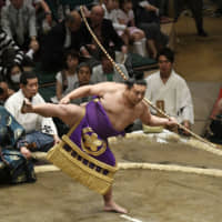 Satonofuji performs  during the bow-twirling ceremony on the opening day of the 2016 Summer Grand Sumo Tournament at Ryogoku Kokugikan. | KYODO
