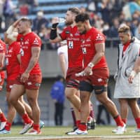 Sunwolves players, seen after a 34-31 loss to the Queensland Reds last Saturday at Prince Chichibu Memorial Rugby Ground, now face the reality that their team is being booted from Super Rugby. The announcement was made on Friday.  kyodo | KYODO