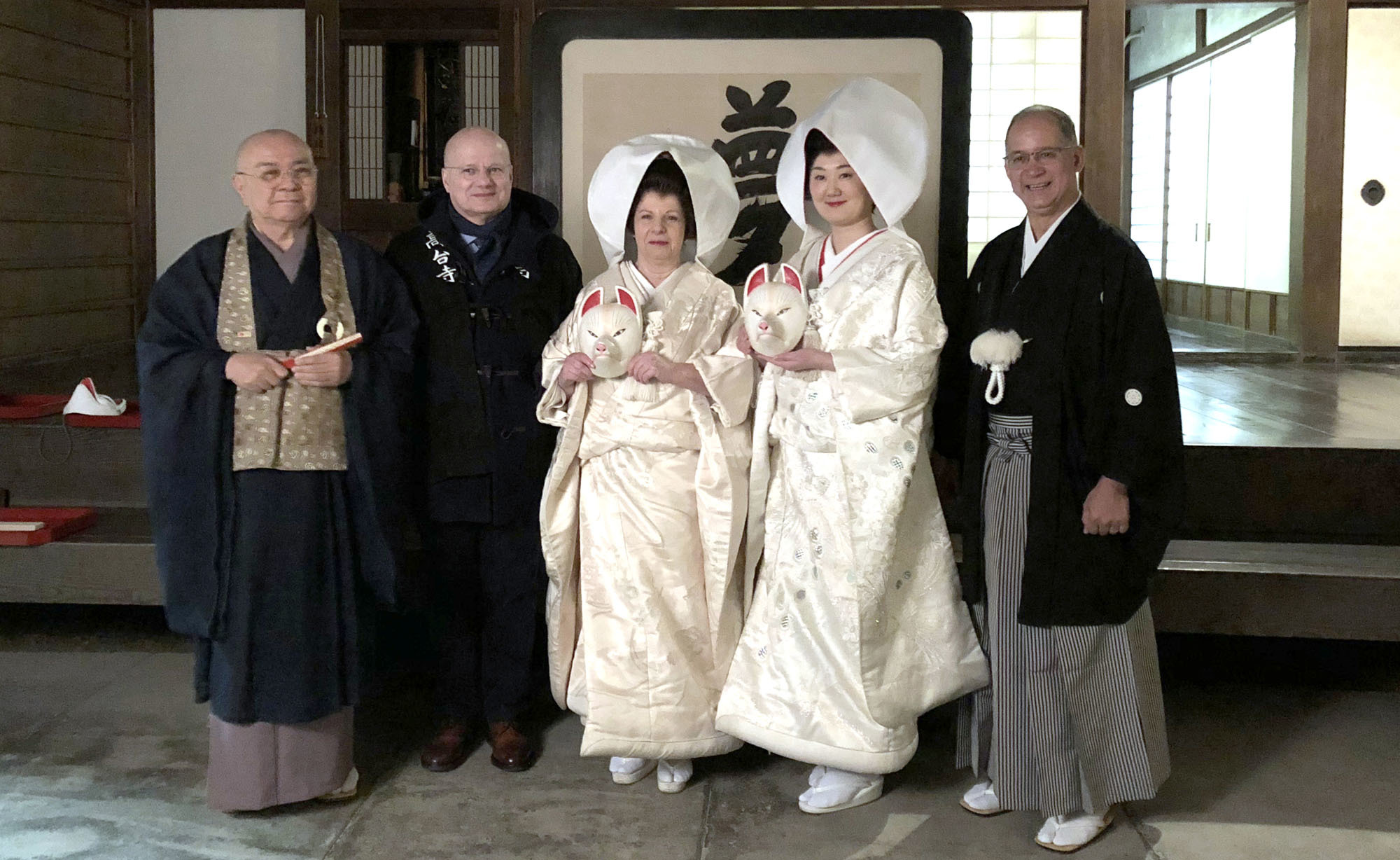 Kodaiji temple's head priest, Tensho Goto (far left), poses with Portuguese Ambassador Francisco Xavier Esteves (second from left) and his wife, Ilda (third from left), along with Panamanian Ambassador Ritter Diaz (far right) and his wife, Ayana Hatada, during the Kitsune no Yomeiri (Fox's Wedding Parade) in Kyoto's Higashiyama district on March 8. The parade lasts until March 17. |  TAKAHIRO HAYASHI