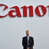 Toshio Takiguchi, president of Canon Inc.\'s medical business arm Canon Medical Systems Corp., speaks to employees at its headquarters in Otawara, Tochigi Prefecture, in January. | KYODO