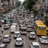 Heavy traffic clogs a street in Yangon, Myanmar. | BLOOMBERG