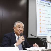 Nippon Paint Holdings Co.\'s CEO Tetsushi Tado speaks at a news conference in Tokyo on Wednesday. | KYODO