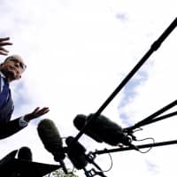 White House economic adviser Larry Kudlow speaks to reporters at the White House in Washington Monday. | REUTERS