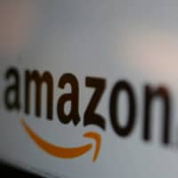 Japan\'s antitrust watchdog suspects Amazon and other technology giants are using their dominate positions to disadvantage vendors on their e-commerce sites or smartphone apps. | REUTERS