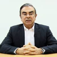 In this image made from video released by Carlos Ghosn via his lawyer on April 9, former Nissan chairman Ghosn speaks on camera in Tokyo. | CARLOS GHOSN / VIA AP