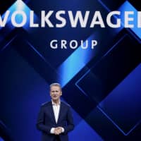 Herbert Diess, Volkswagen\'s new CEO, speaks at a Volkswagen Group\'s media event ahead of the Beijing Auto Show in Beijing last April. | REUTERS