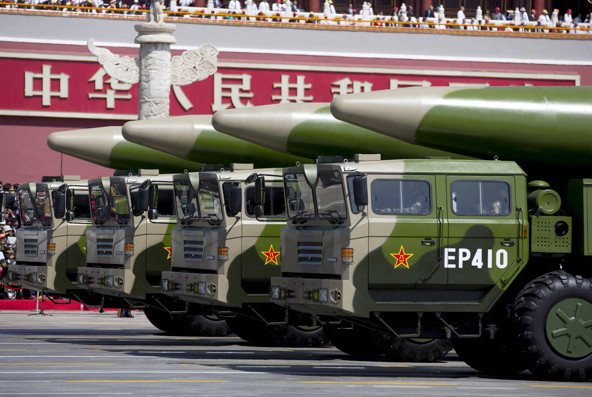 Chinese military vehicles carrying DF-26 ballistic missiles travel in Beijing's Tiananmen Square during a military parade to commemorate the 70th anniversary of the end of World War II on Sept. 3, 2015. | REUTERS
