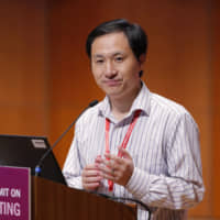 He Jiankui speaks during the Human Genome Editing Conference in Hong Kong last fall. On Tuesday, Stanford University said it had cleared three faculty members of any wrongdoing in dealings with He, who claims to have helped make the world\'s first gene-edited babies. | AP