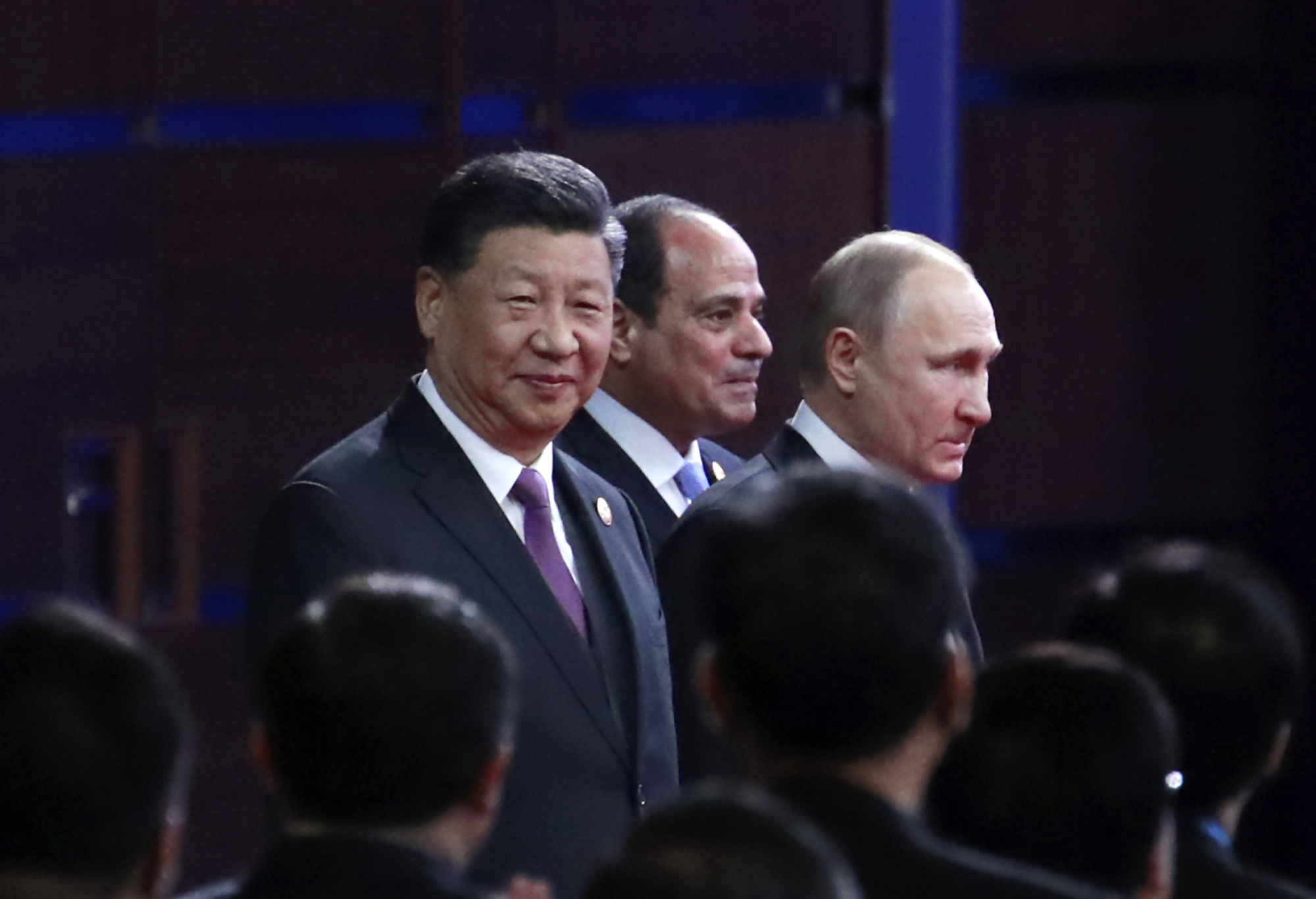 Chinese President Xi Jinping, Egyptian President Abdel-Fattah el-Sissi and Russian President Vladimir Putin arrive for the opening ceremony of the second Belt and Road Forum for International Cooperation in Beijing on Friday. | AP
