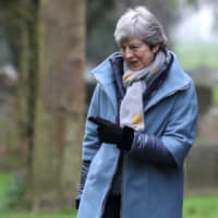 British Prime Minister Theresa May leaves a church near High Wycombe, England, on Sunday. | REUTERS