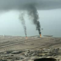 Iran\'s Lavan oil refinery quay on the Islamic republic\'s Lavan island is seen in 2004. The United States said Monday it would start imposing sanctions on friends such as India that buy Iranian oil, in its latest aggressive step to counter Tehran that could jeopardize U.S. relationships. The announcement sent global crude prices spiraling higher, although President Donald Trump tweeted that Saudi Arabia and other U.S. allies would \"more than make up\" for decreases in Iranian oil. | AFP-JIJI