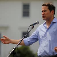U.S. Congressman Seth Moulton (D-MA) speaks at a Merrimack County Democrats Summer Social at the Swett home in Bow, New Hampshire, last July. | REUTERS