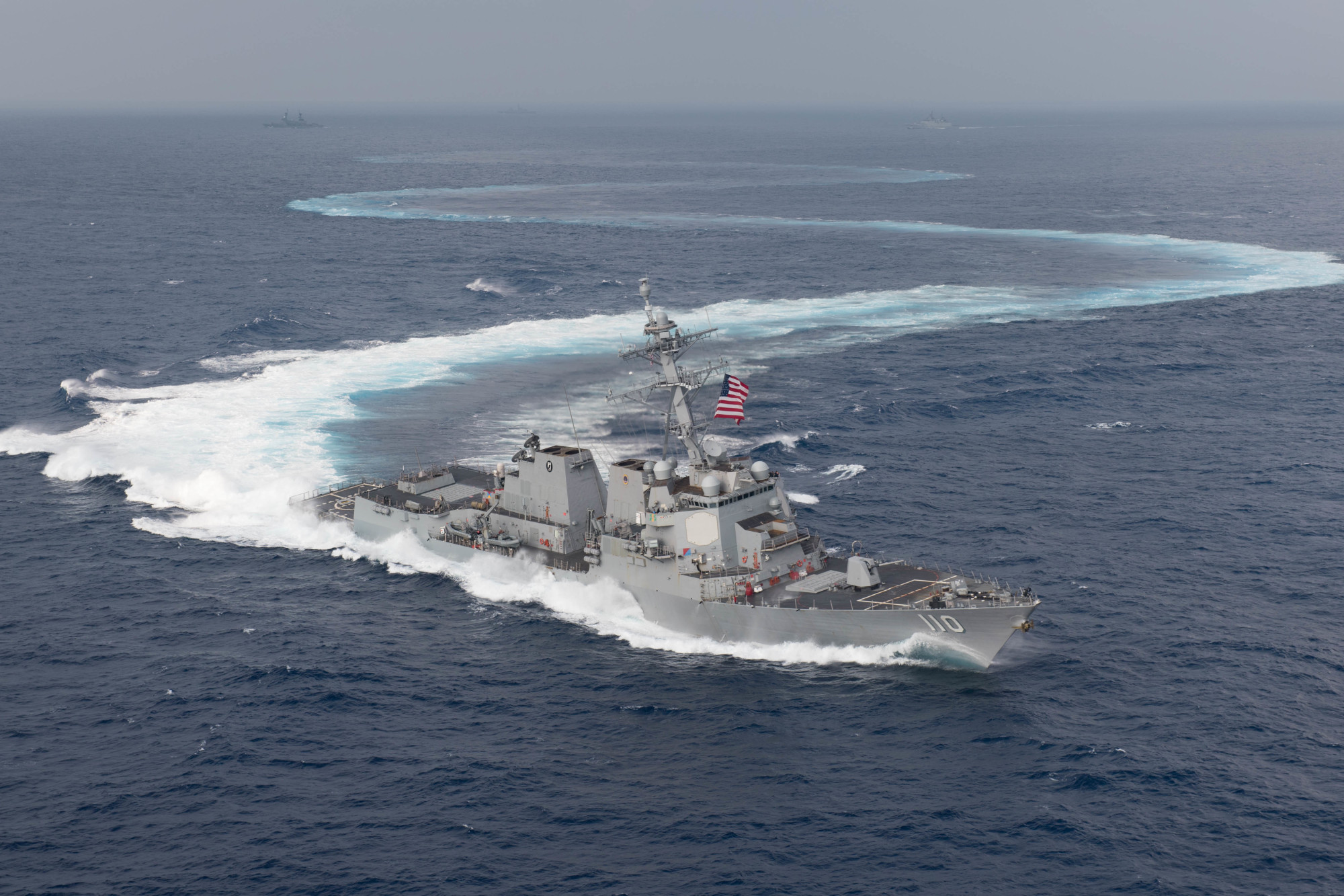 The guided-missile destroyer USS William P. Lawrence practices ship maneuvers as it transits the Pacific Ocean last June. | U.S. NAVY